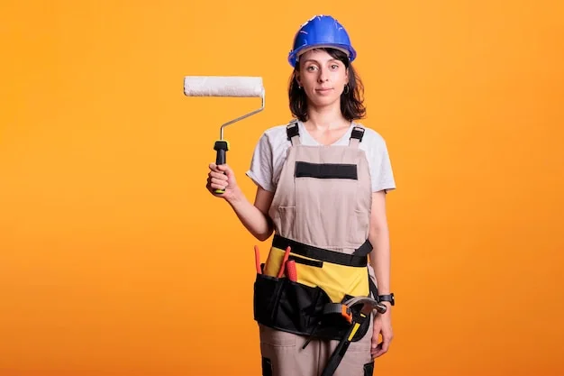 Painter rolling fresh coat on wall
